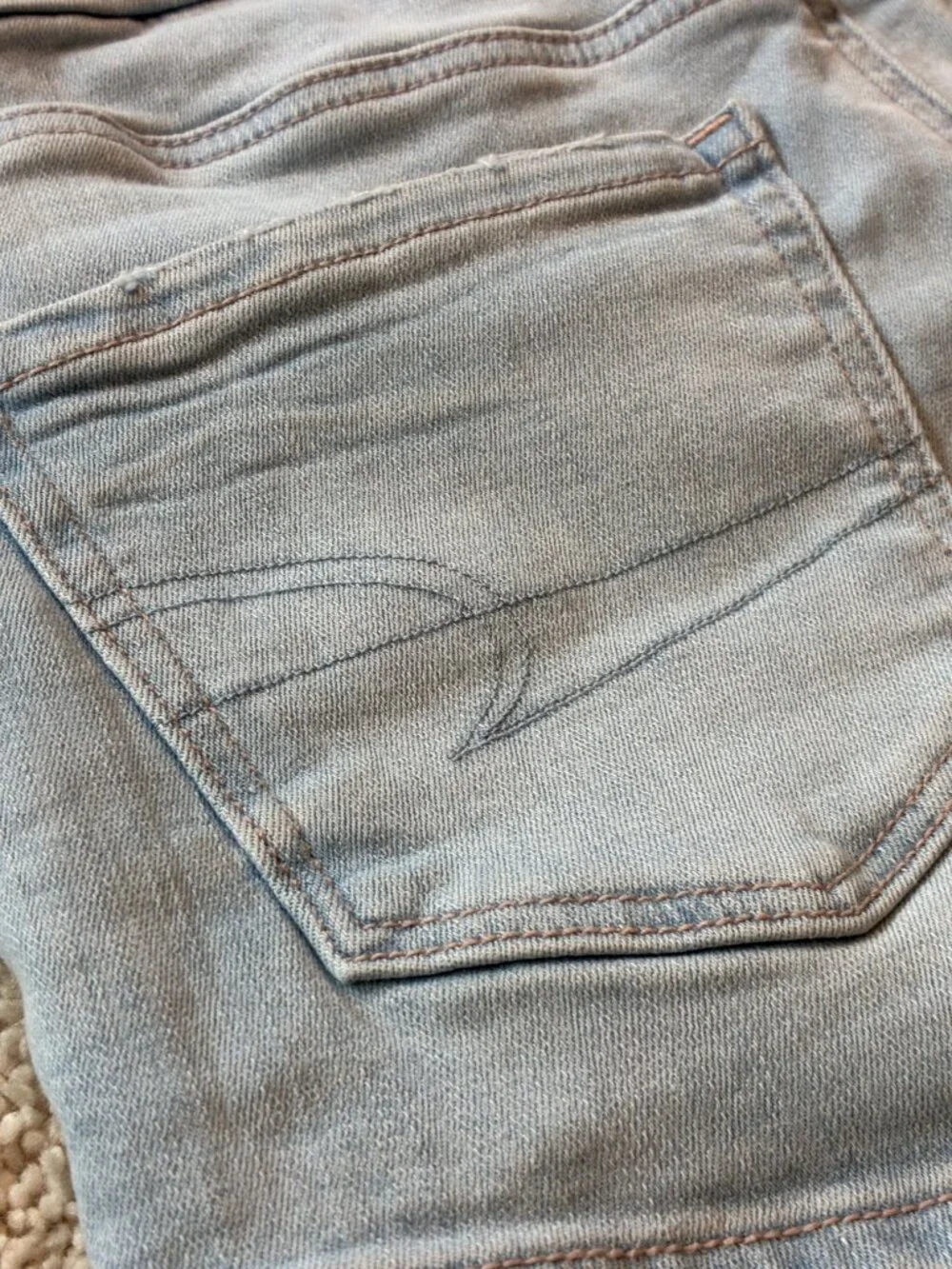 American Eagle Curvy High-Rise Shortie Stretch Jean Cross-Front Button Shorts - Picture 9 of 14